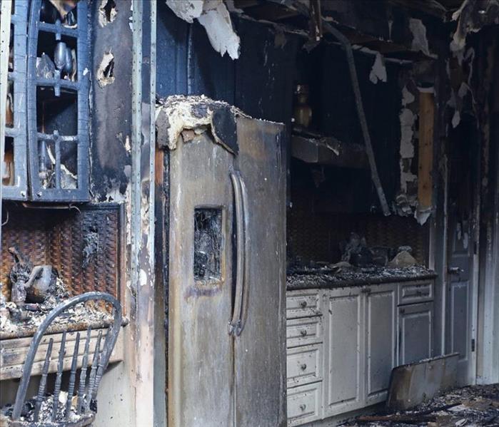 "smoke and fire damaged kitchen" 